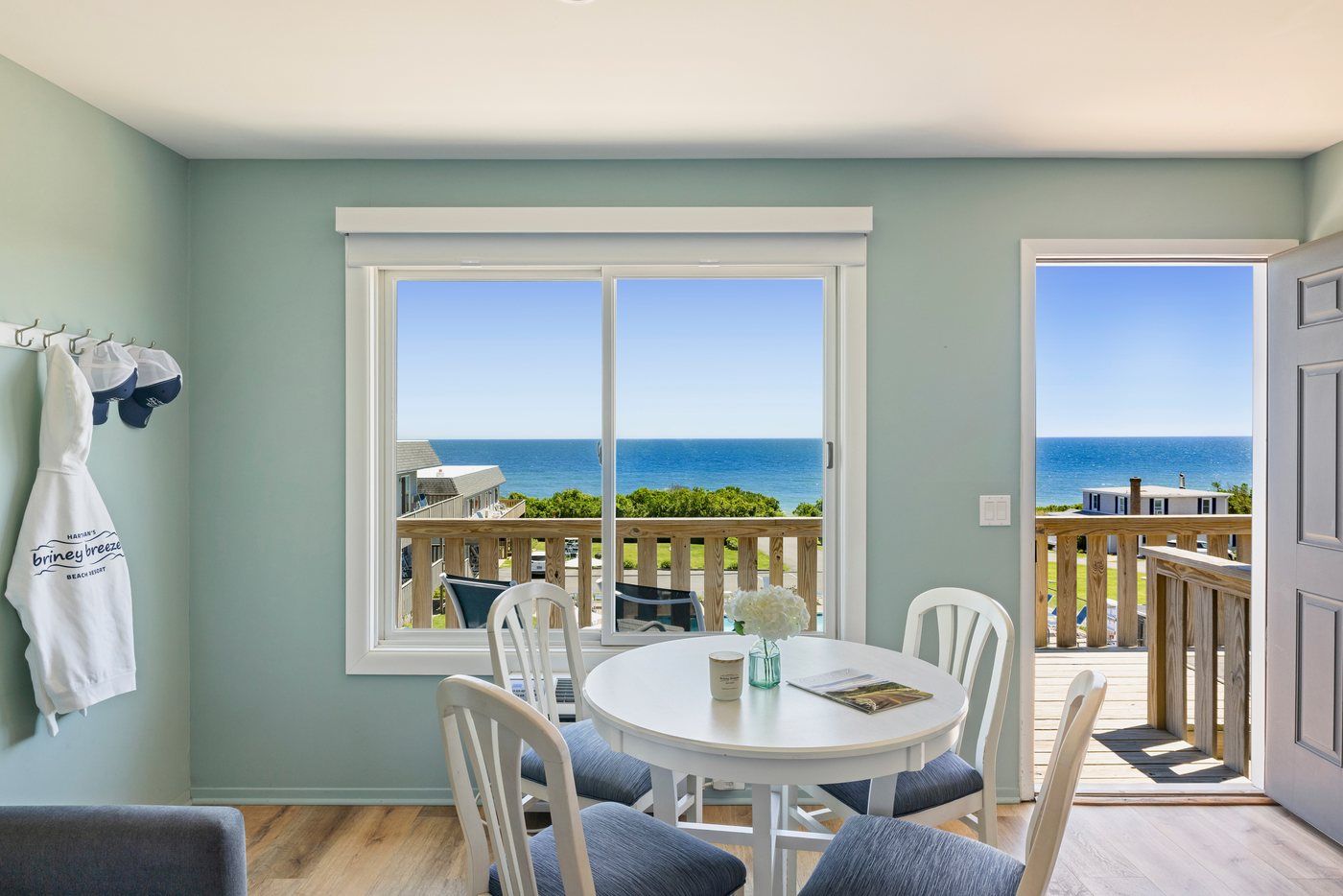 A private deck with seating overlooking the Atlantic at Briney Breezes